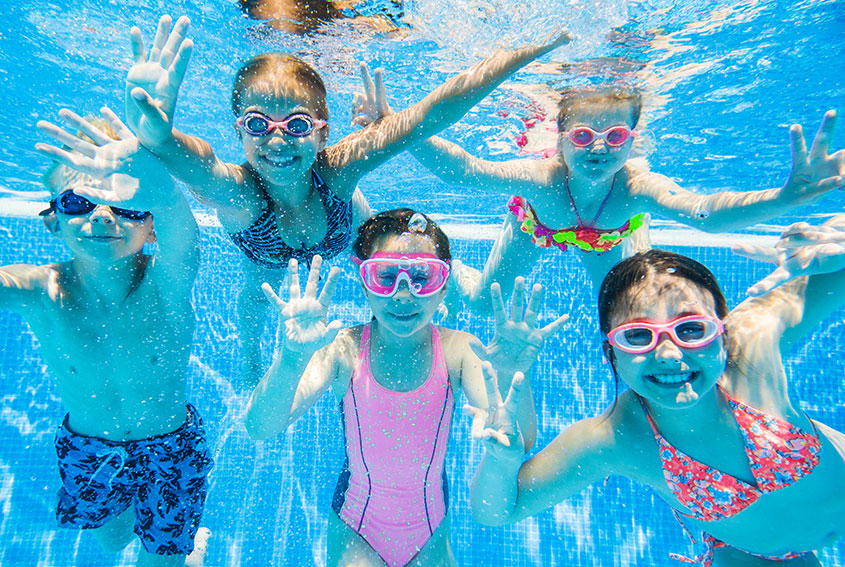 Kids swimming in pool